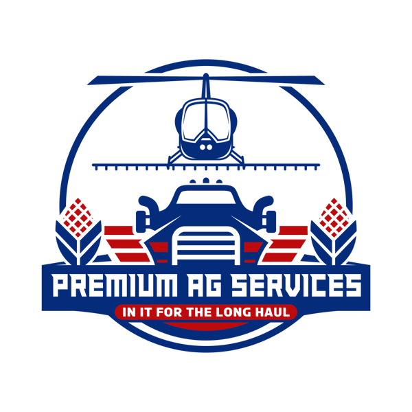 Premium Ag Services logo: helicopter with spray boom above a semi truck, flanked by corn stalks, with the tagline In It For The Long Haul